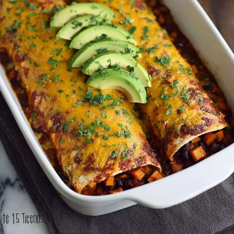 Veggie Enchiladas with Sweet Potatoes, Black Beans, and Cheddar Recipe